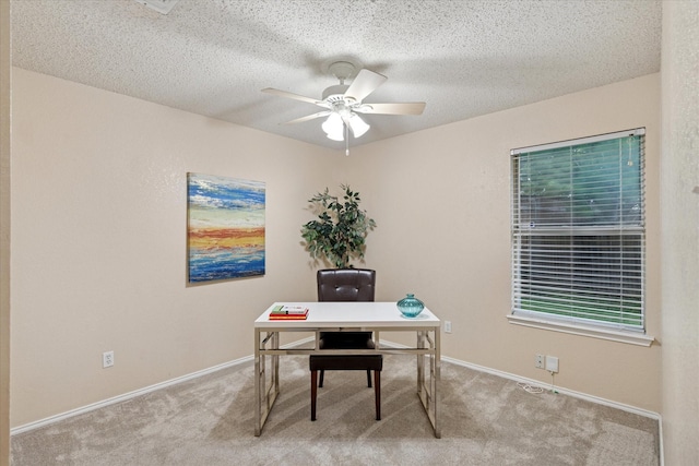 2611 Winding Rd, Fort Worth, TX 76133 - home office featuring light carpet, ceiling fan, and a textured ceiling