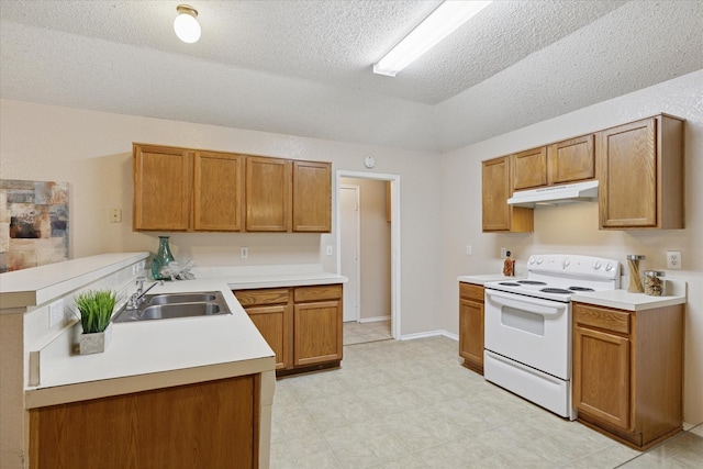 2611 Winding Rd, Fort Worth, TX 76133 - kitchen with white electric range, under cabinet range hood, a peninsula, a textured ceiling, and light countertops