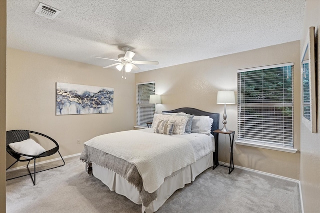 2611 Winding Rd, Fort Worth, TX 76133 - bedroom featuring carpet flooring, a textured ceiling, and ceiling fan