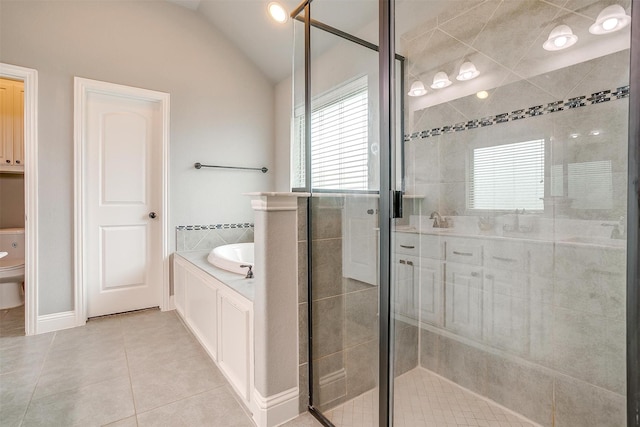 201 Saxon St, Waxahachie, TX 75165 - full bath featuring a bath, plenty of natural light, a shower stall, and vaulted ceiling