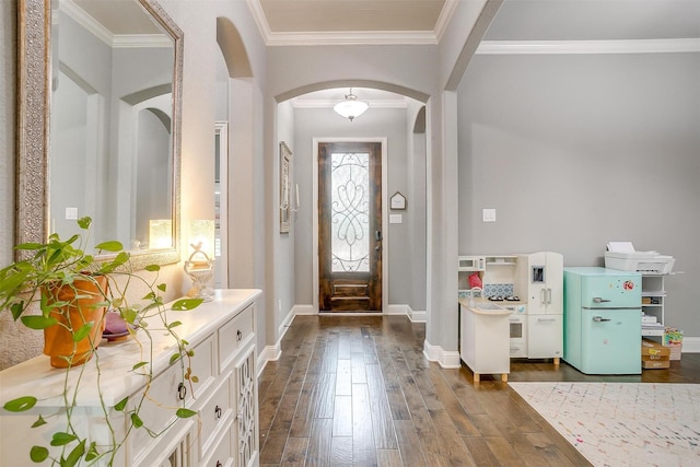 201 Saxon St, Waxahachie, TX 75165 - foyer featuring arched walkways, dark wood-type flooring, and crown molding