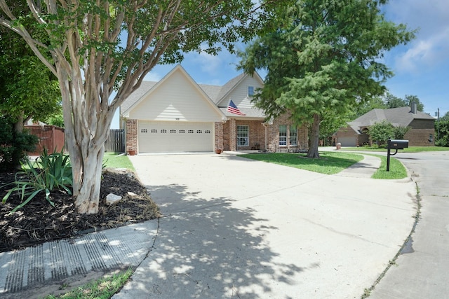 905 Austin Acre, Sulphur Springs, TX 75482 - view of front of house with concrete driveway, a garage, and brick siding