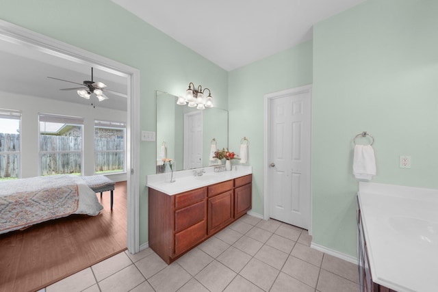 905 Austin Acre, Sulphur Springs, TX 75482 - bathroom featuring vanity, tile patterned floors, a ceiling fan, and ensuite bath