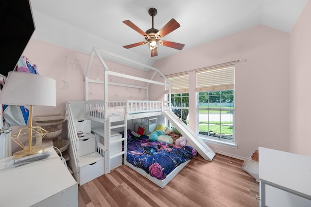 905 Austin Acre, Sulphur Springs, TX 75482 - bedroom with light wood-type flooring, vaulted ceiling, and a ceiling fan