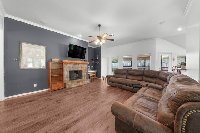905 Austin Acre, Sulphur Springs, TX 75482 - living room featuring ornamental molding, ceiling fan, a stone fireplace, wood finished floors, and recessed lighting