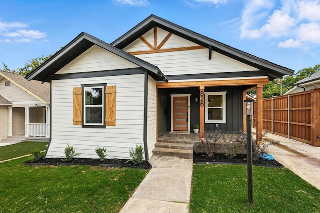 826 W Canty St, Dallas, TX 75208 - view of front of house featuring a porch and board and batten siding