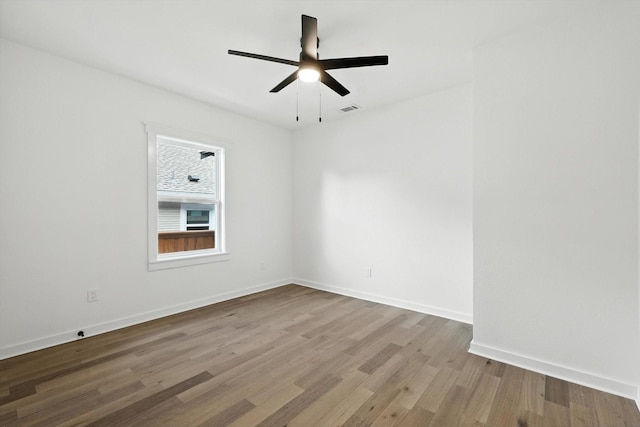 826 W Canty St, Dallas, TX 75208 - unfurnished room with wood finished floors and a ceiling fan