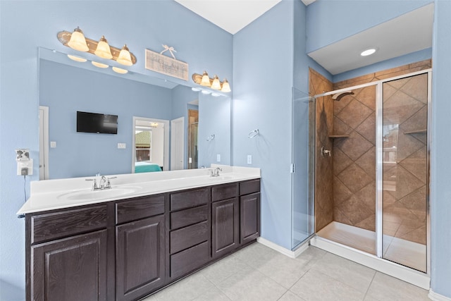209 Willet Ct, Little Elm, TX 75068 - bathroom featuring double vanity, a shower stall, and tile patterned floors