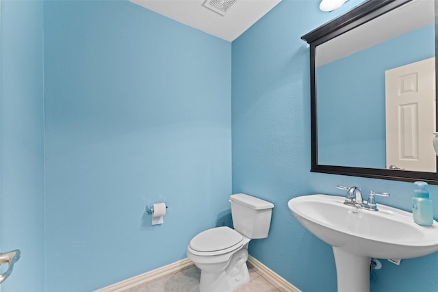 209 Willet Ct, Little Elm, TX 75068 - bathroom featuring toilet and tile patterned flooring