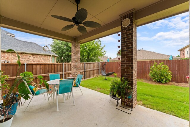209 Willet Ct, Little Elm, TX 75068 - fenced backyard with a patio, ceiling fan, and outdoor dining space