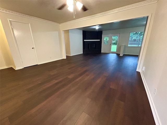 128 Robert St, Burleson, TX 76028 - unfurnished living room featuring a fireplace, dark wood-style floors, a ceiling fan, and ornamental molding