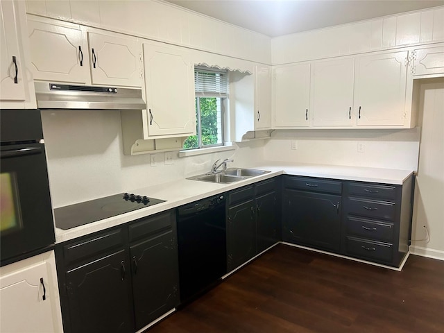 128 Robert St, Burleson, TX 76028 - kitchen featuring black appliances, under cabinet range hood, white cabinetry, dark wood-type flooring, and light countertops
