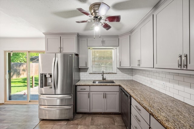 612 Elm St, Hurst, TX 76053 - kitchen with appliances with stainless steel finishes, gray cabinets, and plenty of natural light