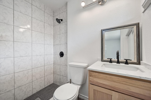 612 Elm St, Hurst, TX 76053 - bathroom with vanity and tiled shower