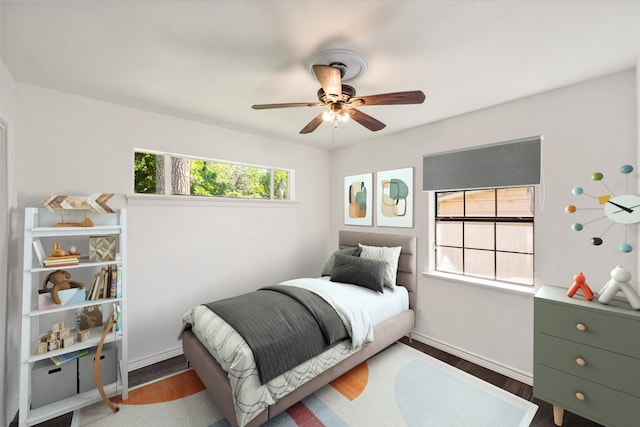 612 Elm St, Hurst, TX 76053 - bedroom featuring wood finished floors and a ceiling fan
