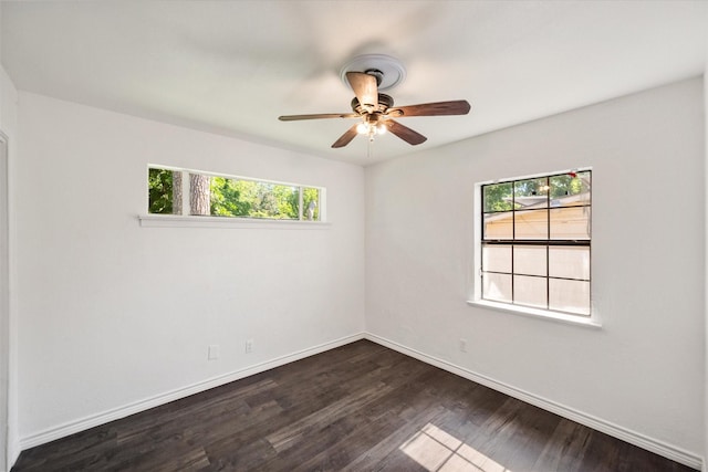 612 Elm St, Hurst, TX 76053 - empty room with plenty of natural light, dark wood-style floors, and ceiling fan