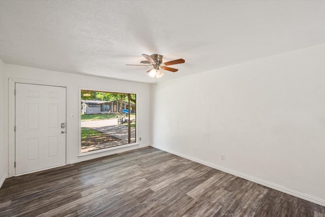 612 Elm St, Hurst, TX 76053 - foyer entrance featuring wood finished floors and ceiling fan