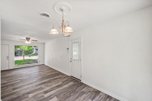 612 Elm St, Hurst, TX 76053 - empty room with a chandelier, wood finished floors, and ceiling fan