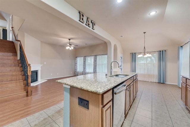 505 Glacier St, Desoto, TX 75115 - kitchen featuring stainless steel dishwasher, light tile patterned flooring, a chandelier, healthy amount of natural light, and recessed lighting