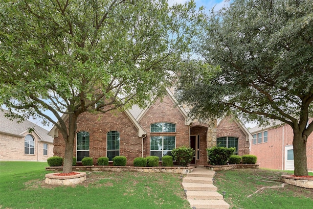 505 Glacier St, Desoto, TX 75115 - view of front of house featuring brick siding and a front lawn
