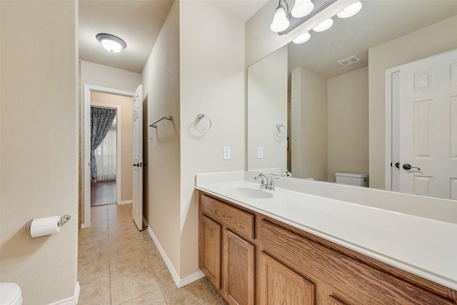 505 Glacier St, Desoto, TX 75115 - bathroom featuring tile patterned floors and vanity