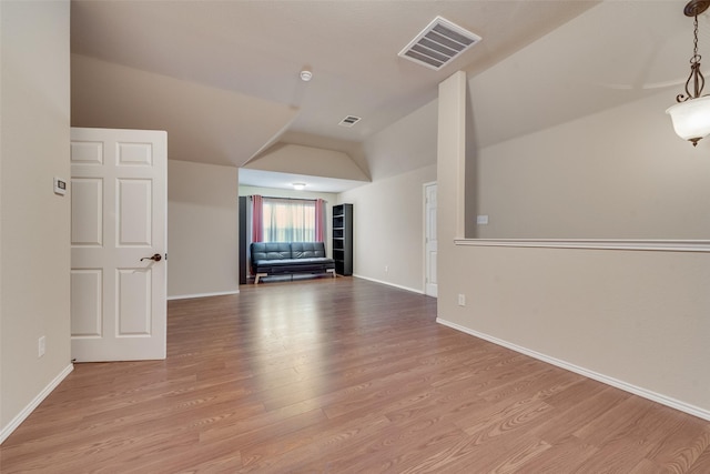 505 Glacier St, Desoto, TX 75115 - unfurnished living room with vaulted ceiling and wood finished floors