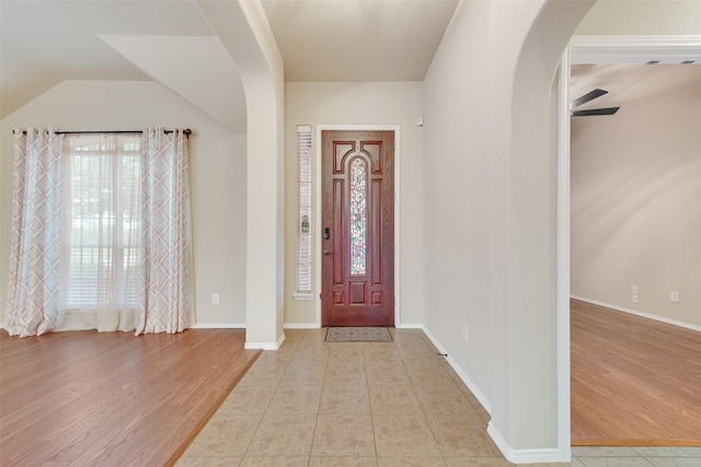 505 Glacier St, Desoto, TX 75115 - foyer featuring arched walkways, wood finished floors, and lofted ceiling