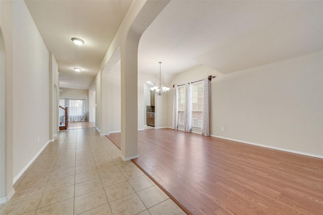 505 Glacier St, Desoto, TX 75115 - unfurnished room featuring a chandelier and light tile patterned floors