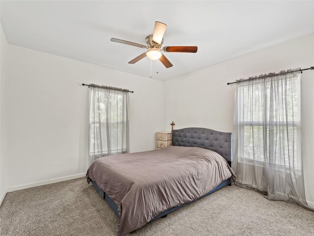 4235 Bonnie View Rd, Dallas, TX 75216 - carpeted bedroom featuring a ceiling fan and baseboards