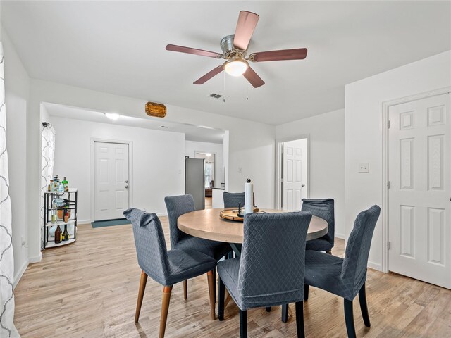 4235 Bonnie View Rd, Dallas, TX 75216 - dining area with light wood-style floors and ceiling fan