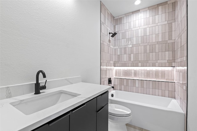 420 N Moore St, Dallas, TX 75203 - full bathroom with vanity, bathing tub / shower combination, a textured wall, and recessed lighting