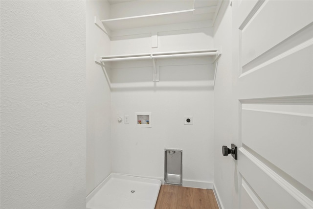 420 N Moore St, Dallas, TX 75203 - washroom with washer hookup, electric dryer hookup, and wood finished floors