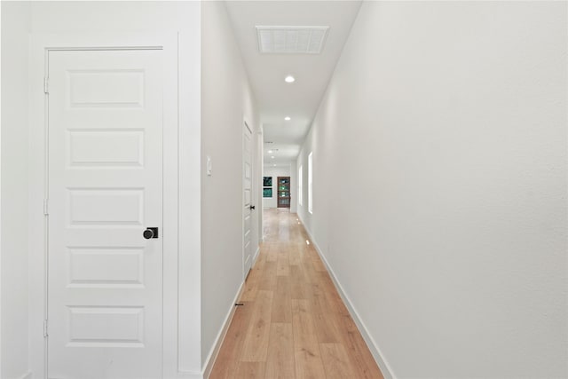 420 N Moore St, Dallas, TX 75203 - hallway with light wood-style floors and recessed lighting