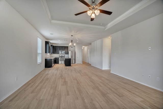529 Mesa View Trl, Fort Worth, TX 76131 - unfurnished living room featuring a raised ceiling, a chandelier, light wood-type flooring, and crown molding