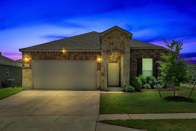 529 Mesa View Trl, Fort Worth, TX 76131 - french country style house featuring stone siding, driveway, an attached garage, roof with shingles, and a lawn