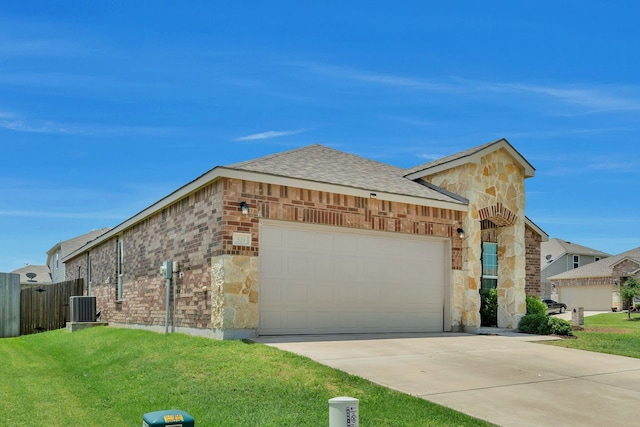 529 Mesa View Trl, Fort Worth, TX 76131 - view of front facade with stone siding, a garage, driveway, and roof with shingles