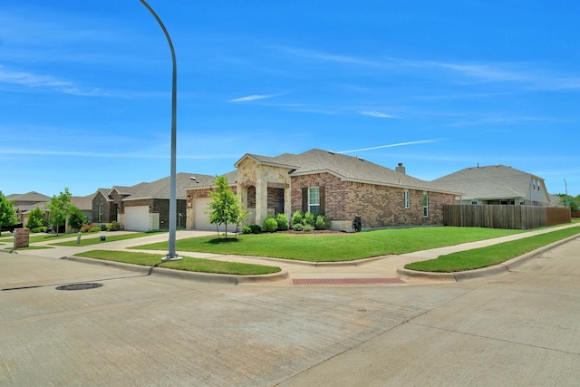 529 Mesa View Trl, Fort Worth, TX 76131 - ranch-style home featuring a garage, driveway, brick siding, a residential view, and stone siding