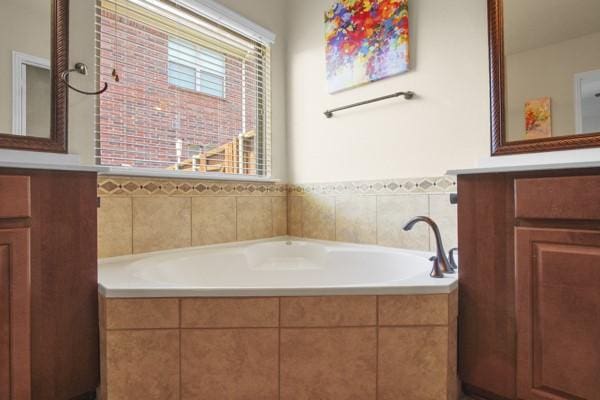 1165 Breakwater Dr, Frisco, TX 75036 - bathroom featuring vanity and a garden tub