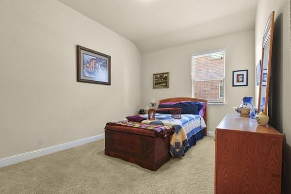 1165 Breakwater Dr, Frisco, TX 75036 - bedroom with light colored carpet and vaulted ceiling