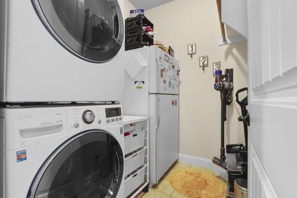 1165 Breakwater Dr, Frisco, TX 75036 - laundry room with stacked washing machine and dryer