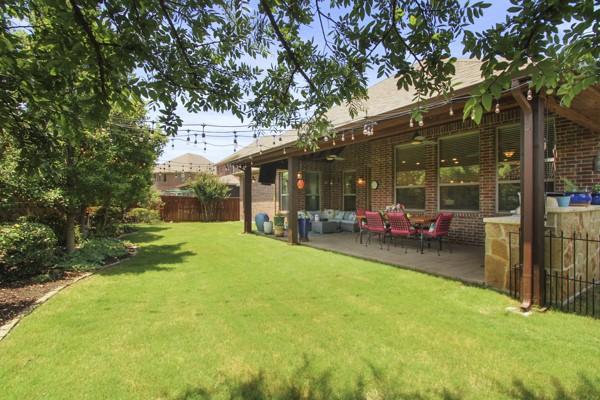 1165 Breakwater Dr, Frisco, TX 75036 - view of yard with a patio and outdoor lounge area