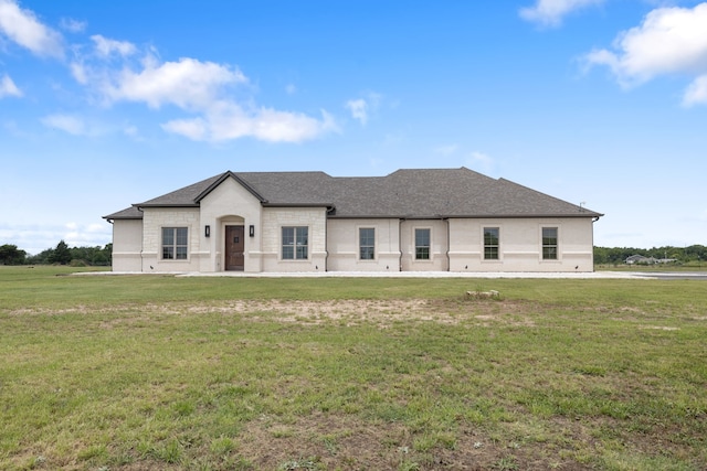 580 Vz County Road 3422, Wills Point, TX 75169 - french provincial home featuring a front yard and roof with shingles