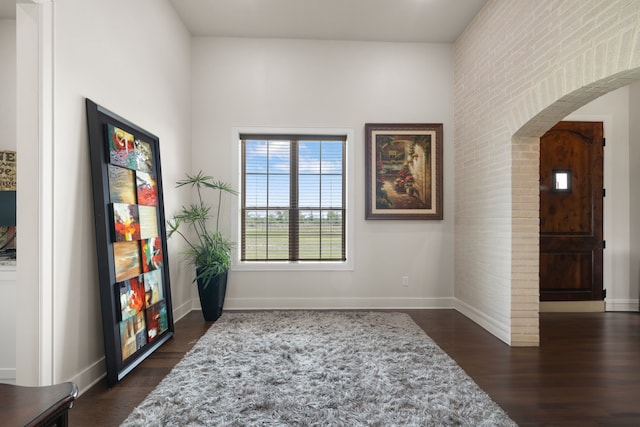 580 Vz County Road 3422, Wills Point, TX 75169 - unfurnished room featuring arched walkways and dark wood-style floors