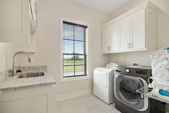 580 Vz County Road 3422, Wills Point, TX 75169 - laundry area featuring cabinet space, washer and dryer, and light tile patterned floors