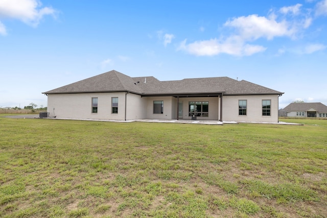 580 Vz County Road 3422, Wills Point, TX 75169 - rear view of house featuring a patio and a lawn