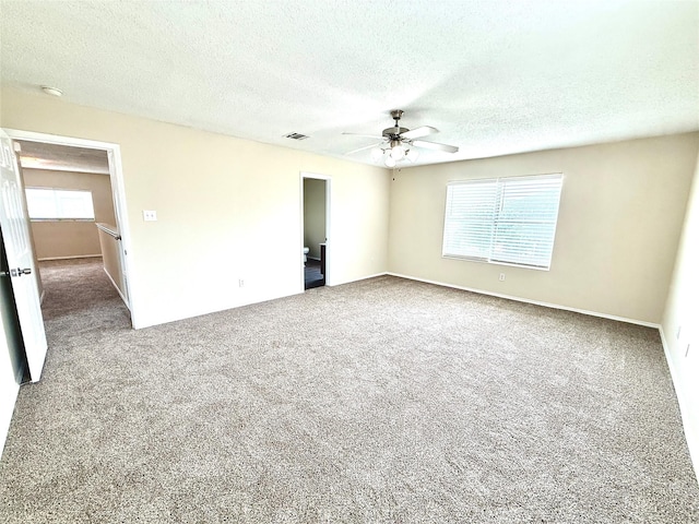 2024 Kings Forest Dr, Heartland, TX 75126 - carpeted spare room featuring a ceiling fan, a textured ceiling, and a smoke detector