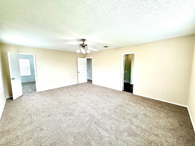 2024 Kings Forest Dr, Heartland, TX 75126 - carpeted empty room with ceiling fan and a textured ceiling
