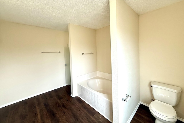 2024 Kings Forest Dr, Heartland, TX 75126 - full bathroom featuring a garden tub, wood finished floors, and a textured ceiling