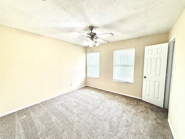2024 Kings Forest Dr, Heartland, TX 75126 - carpeted spare room with ceiling fan and a textured ceiling