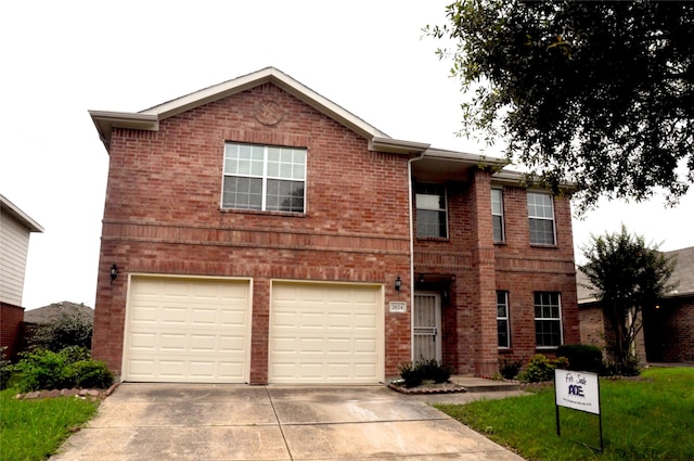 2024 Kings Forest Dr, Heartland, TX 75126 - view of front facade featuring concrete driveway, a garage, and brick siding